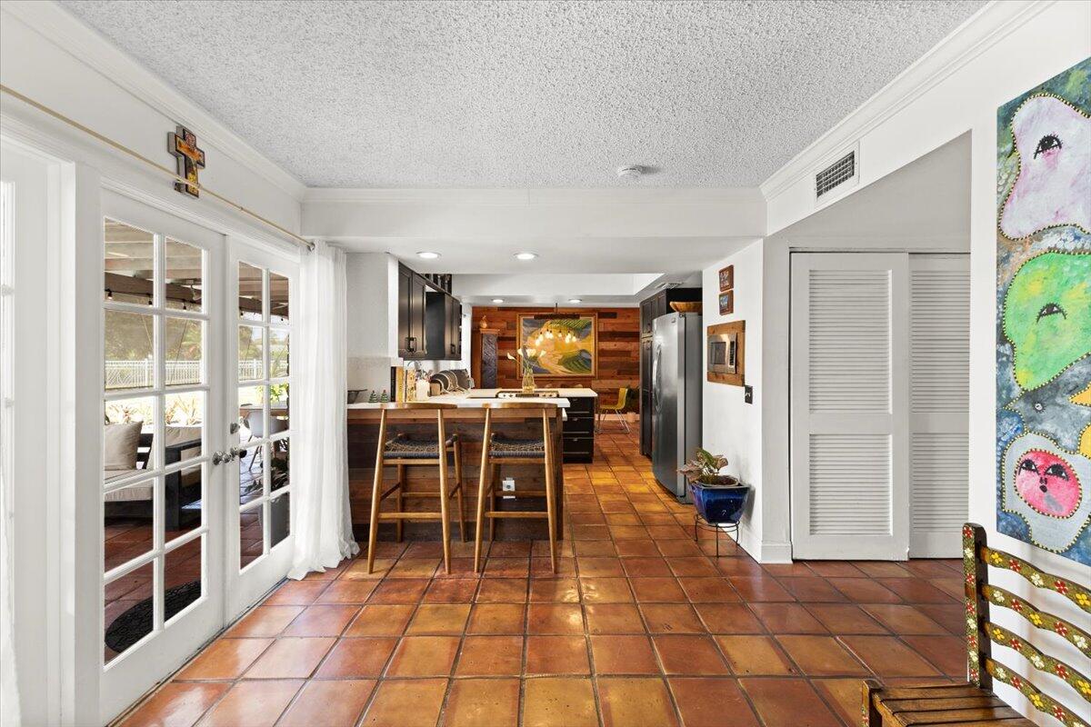 3179 Hoy Lake Road Wellington, FL 33467 - Photo 7 of 43 a view of a kitchen with furniture and windows
