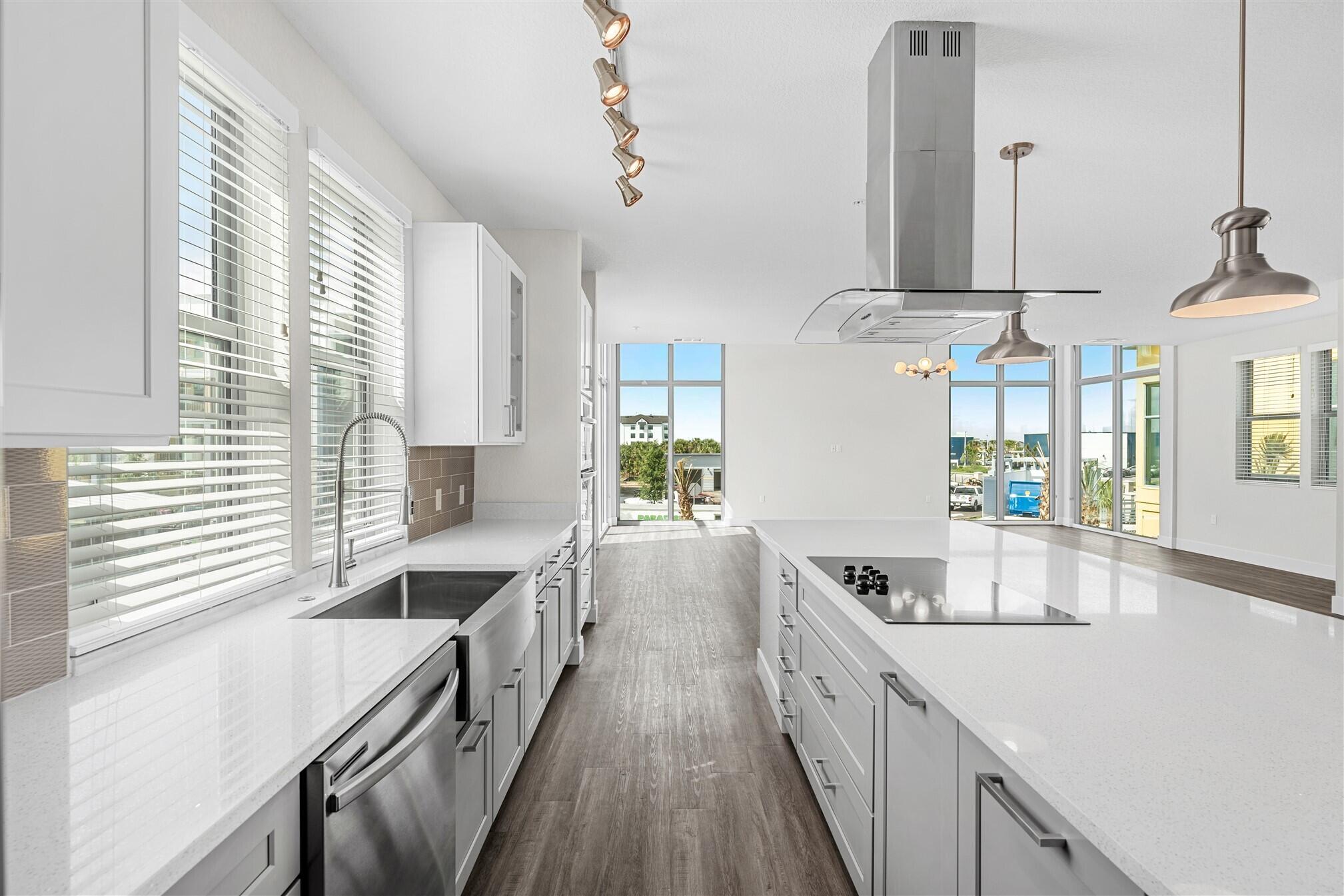 8663 Ivanhoe Drive Melbourne, FL 32940 - Photo 14 of 36 a kitchen with sink and stove