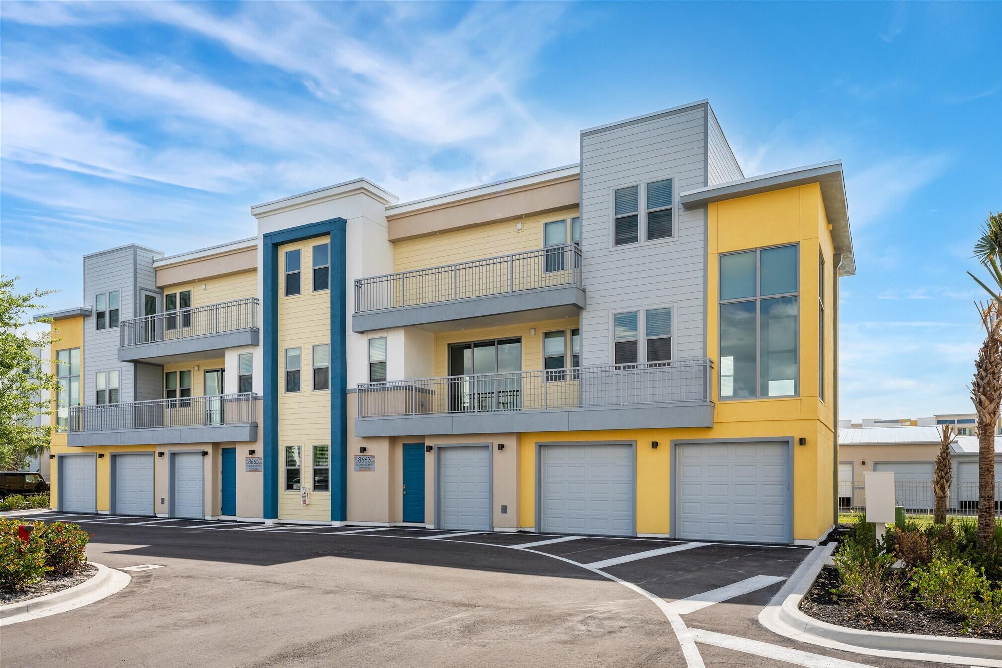 8663 Ivanhoe Drive Melbourne, FL 32940 - Photo 2 of 36 a front view of a building