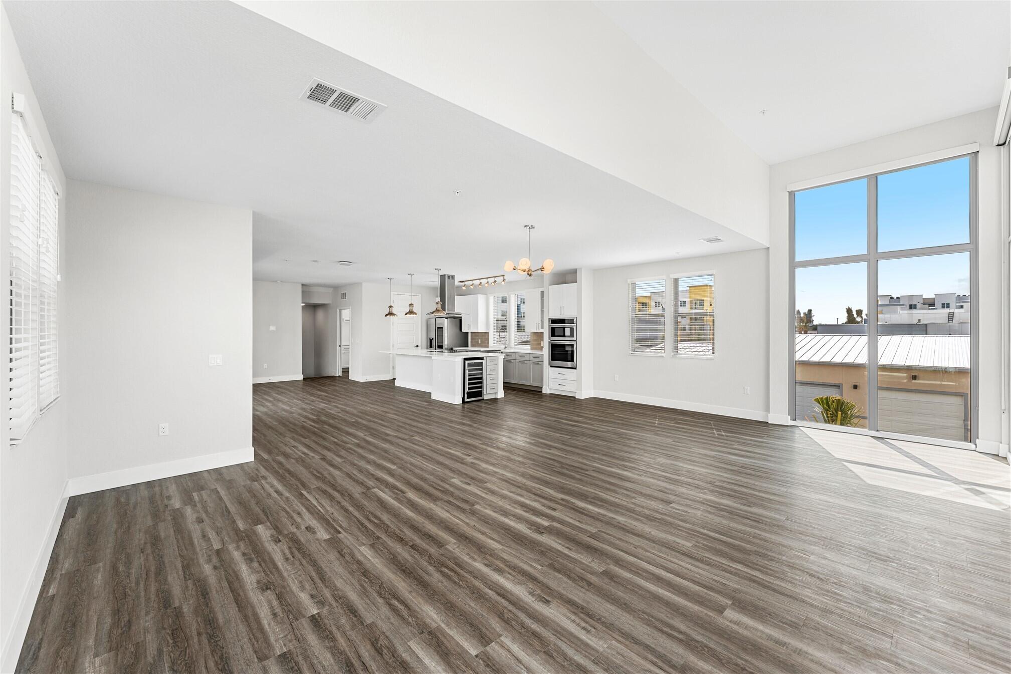 8663 Ivanhoe Drive Melbourne, FL 32940 - Photo 22 of 36 a view of a living room with furniture and wooden floor