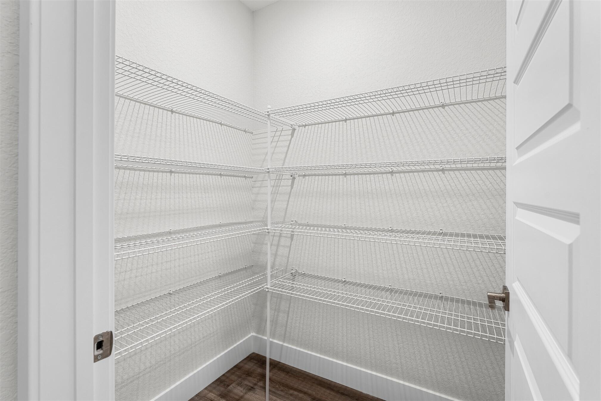 8663 Ivanhoe Drive Melbourne, FL 32940 - Photo 27 of 36 a view of walk in closet
