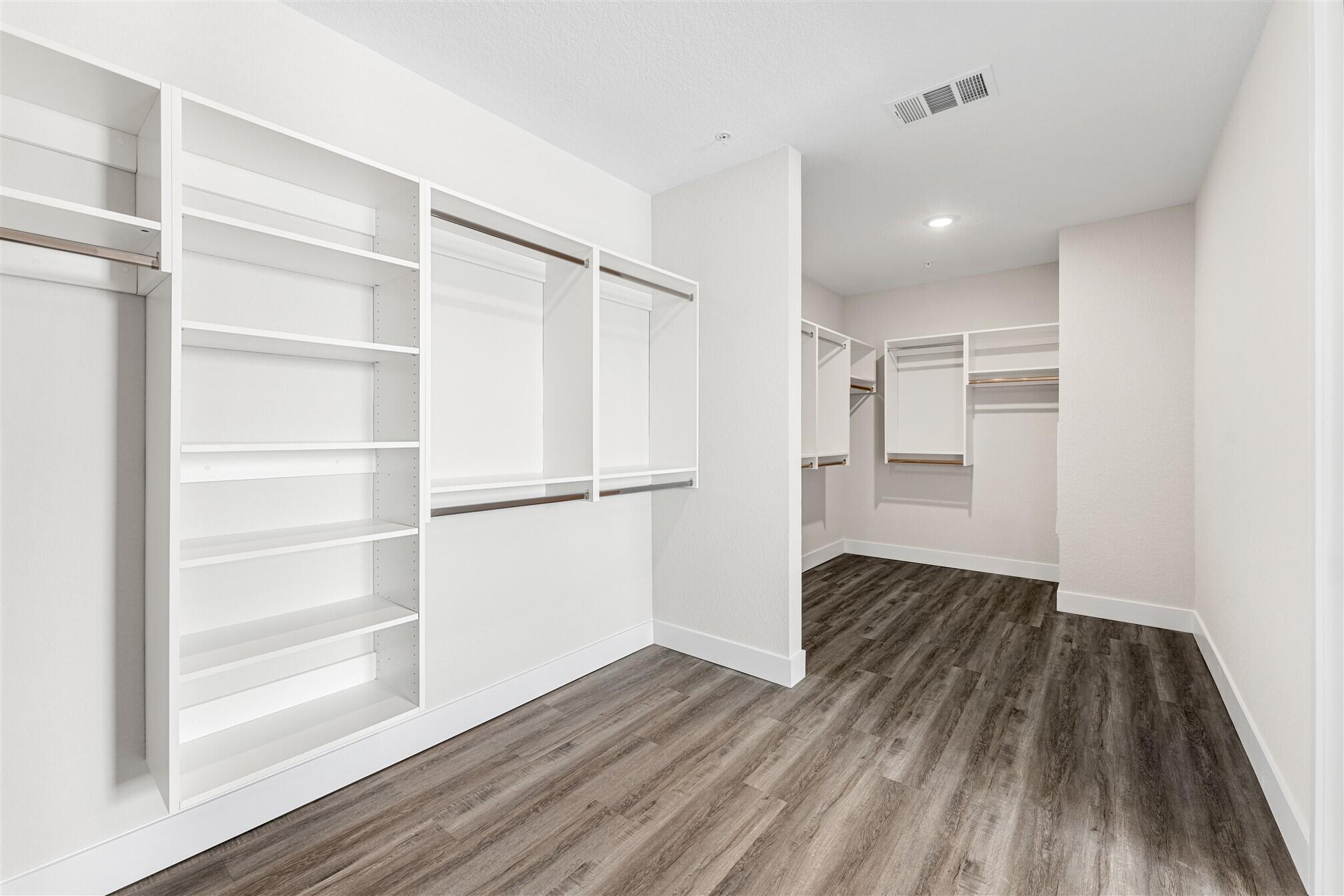 8663 Ivanhoe Drive Melbourne, FL 32940 - Photo 29 of 36 a view of an empty room with wooden floor
