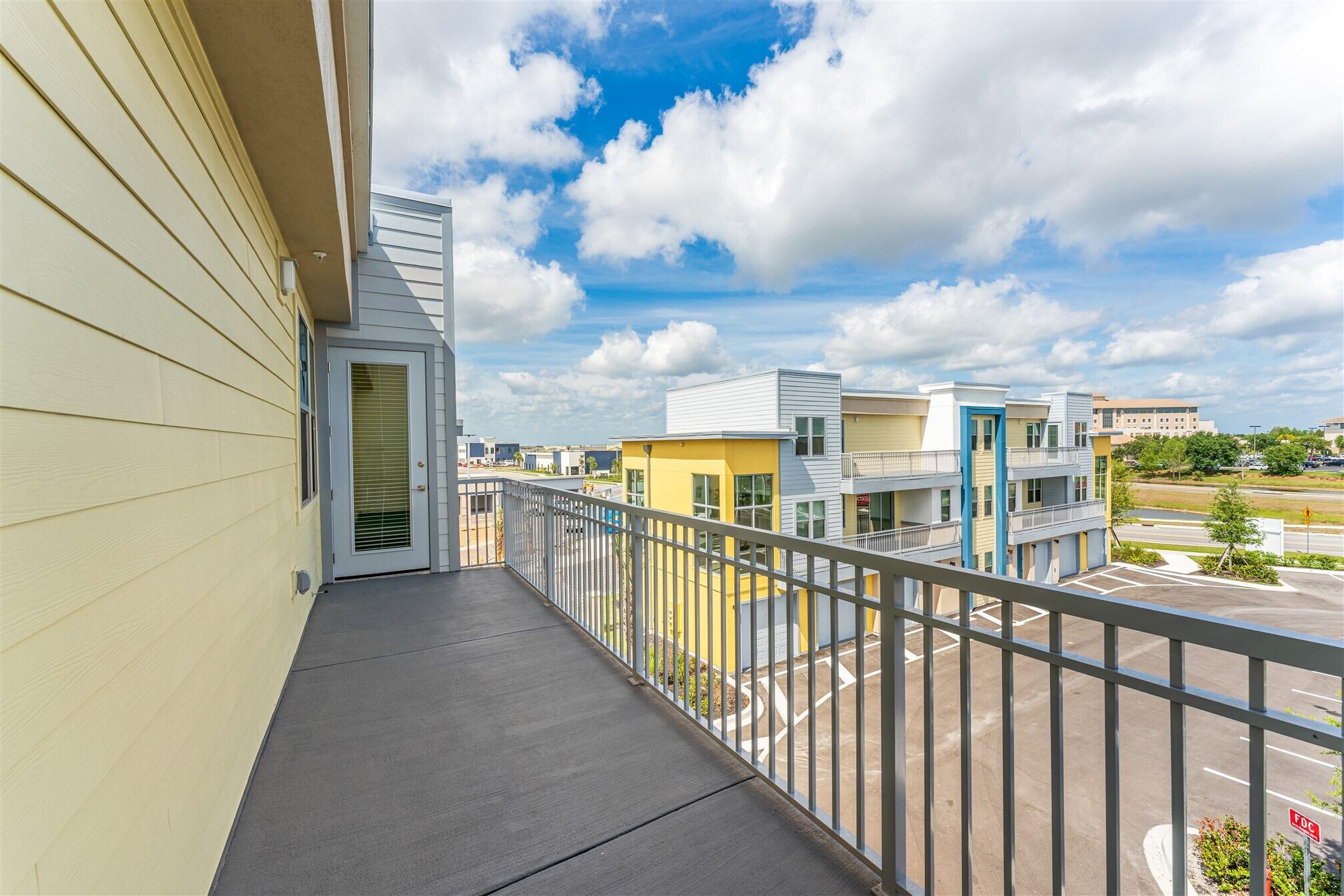 8663 Ivanhoe Drive Melbourne, FL 32940 - Photo 36 of 36 a view of city from a balcony
