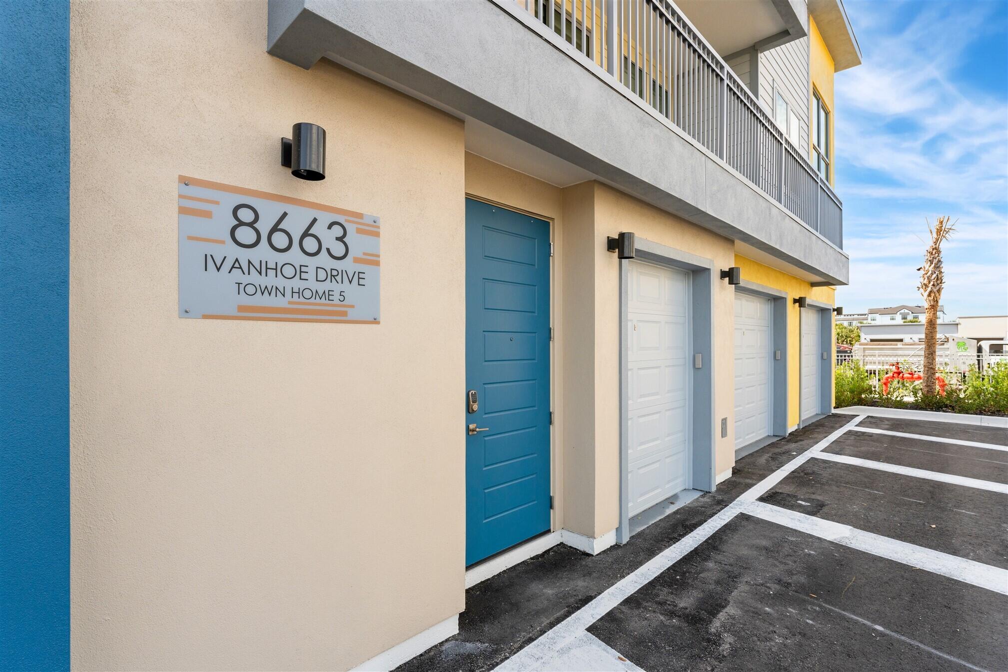8663 Ivanhoe Drive Melbourne, FL 32940 - Photo 4 of 36 a view of a street with an outdoor space