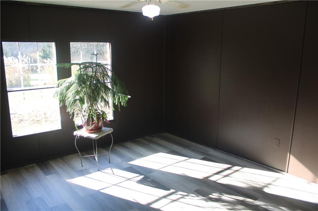 245 Old Brick Road Hilliards, PA 16040 - Photo 11 of 46 a living room with furniture and a potted plant