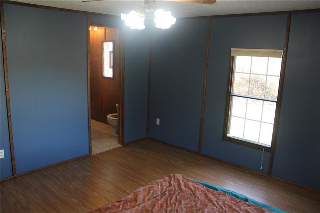 245 Old Brick Road Hilliards, PA 16040 - Photo 12 of 46 an empty room with windows and closet