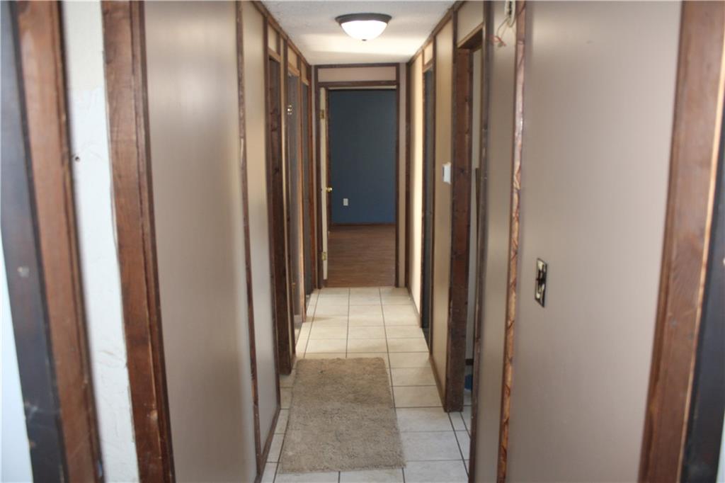245 Old Brick Road Hilliards, PA 16040 - Photo 19 of 46 a view of a hallway with wooden floor