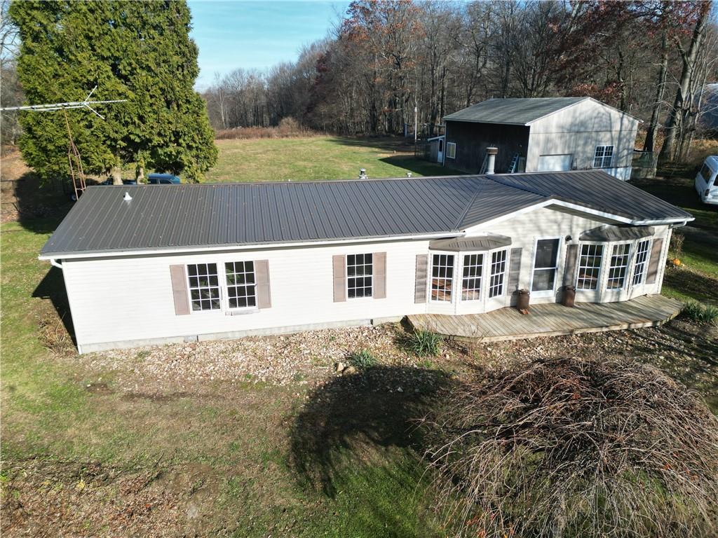 245 Old Brick Road Hilliards, PA 16040 - Photo 25 of 46 a aerial view of a house with a yard