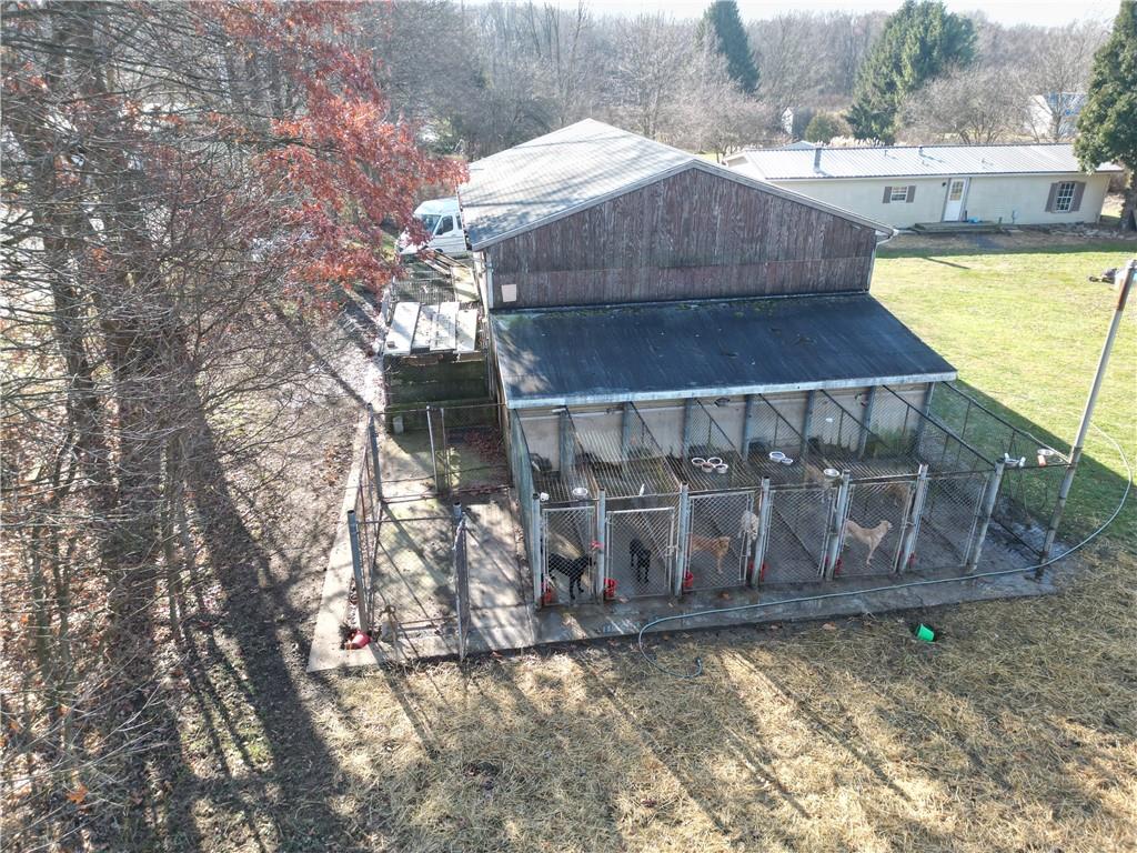 245 Old Brick Road Hilliards, PA 16040 - Photo 39 of 46 a wooden fence with a trees in the background