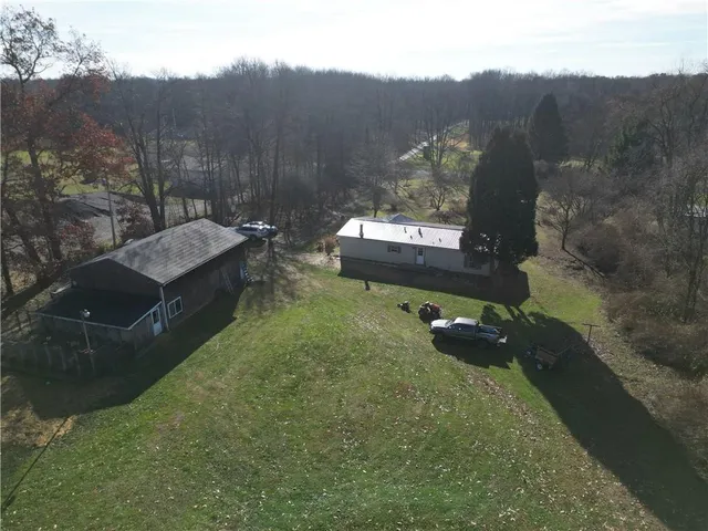 a view of a yard with an outdoor space