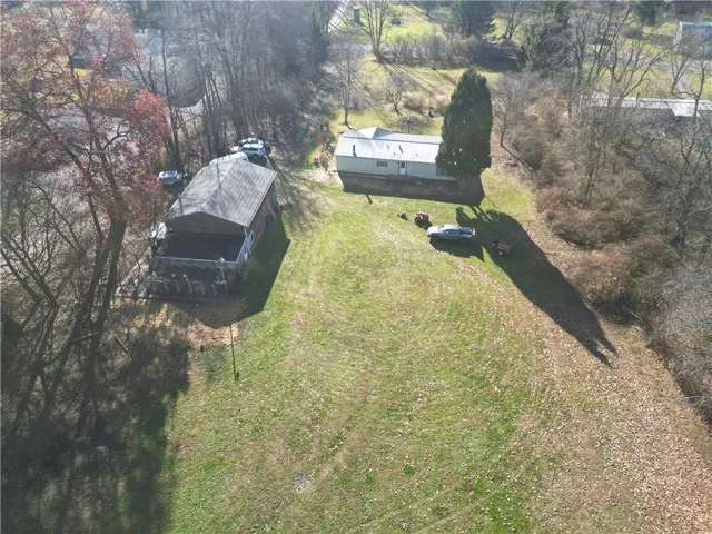 a view of swimming pool with a yard