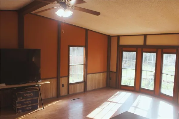 wooden floor and windows in a room