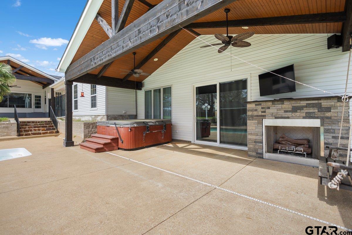 1609 Old Nacogdoches Road Henderson, TX 75654 - Photo 29 of 48 a living room with furniture and a fireplace