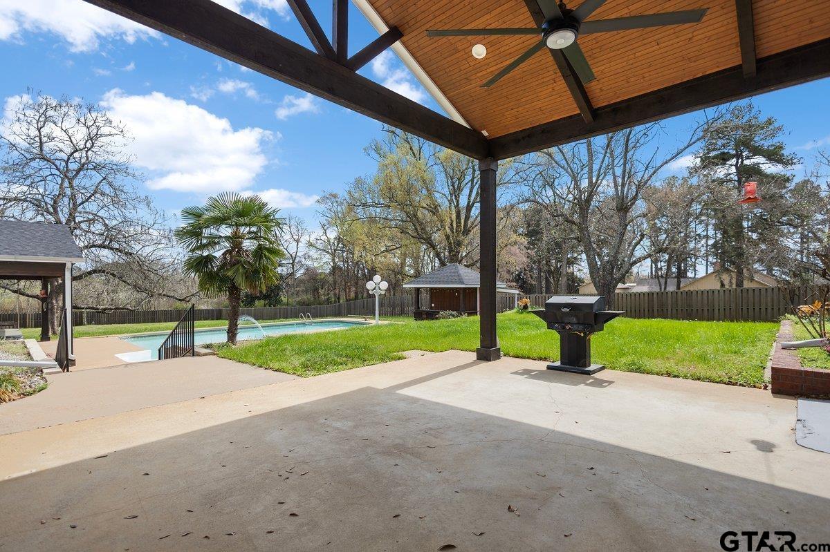 1609 Old Nacogdoches Road Henderson, TX 75654 - Photo 30 of 48 a view of a house with backyard and tree