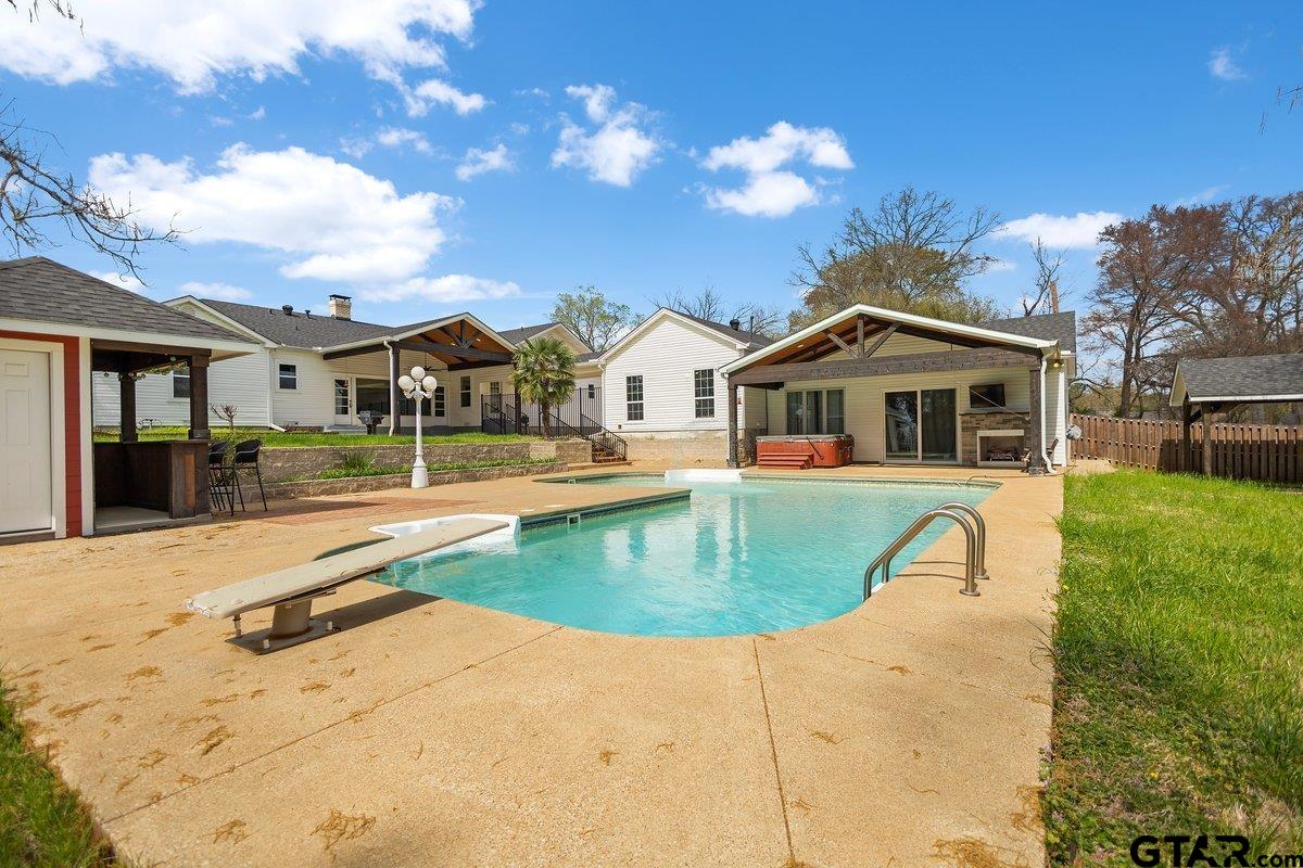 1609 Old Nacogdoches Road Henderson, TX 75654 - Photo 31 of 48 a view of a house with swimming pool