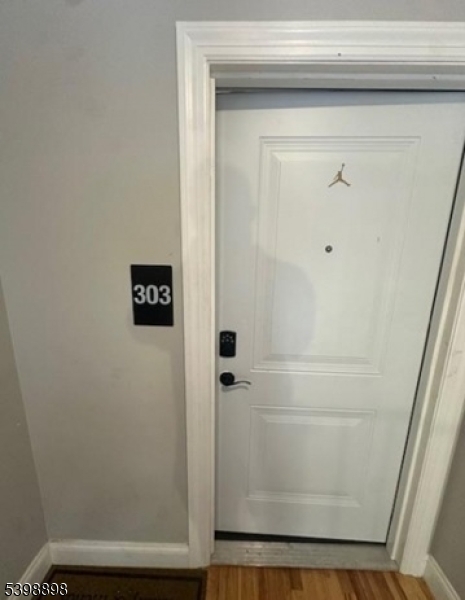 474 10th Avenue, Unit 303 Paterson, NJ 07514 - Photo 1 of 13 a bathroom with a shower