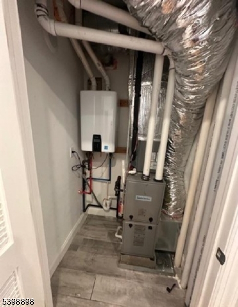 474 10th Avenue, Unit 303 Paterson, NJ 07514 - Photo 7 of 13 a view of storage and utility room