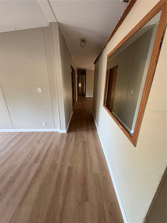 28492 Sentinel Street Nobleton, FL 34661 - Photo 12 of 23 a view of a hallway