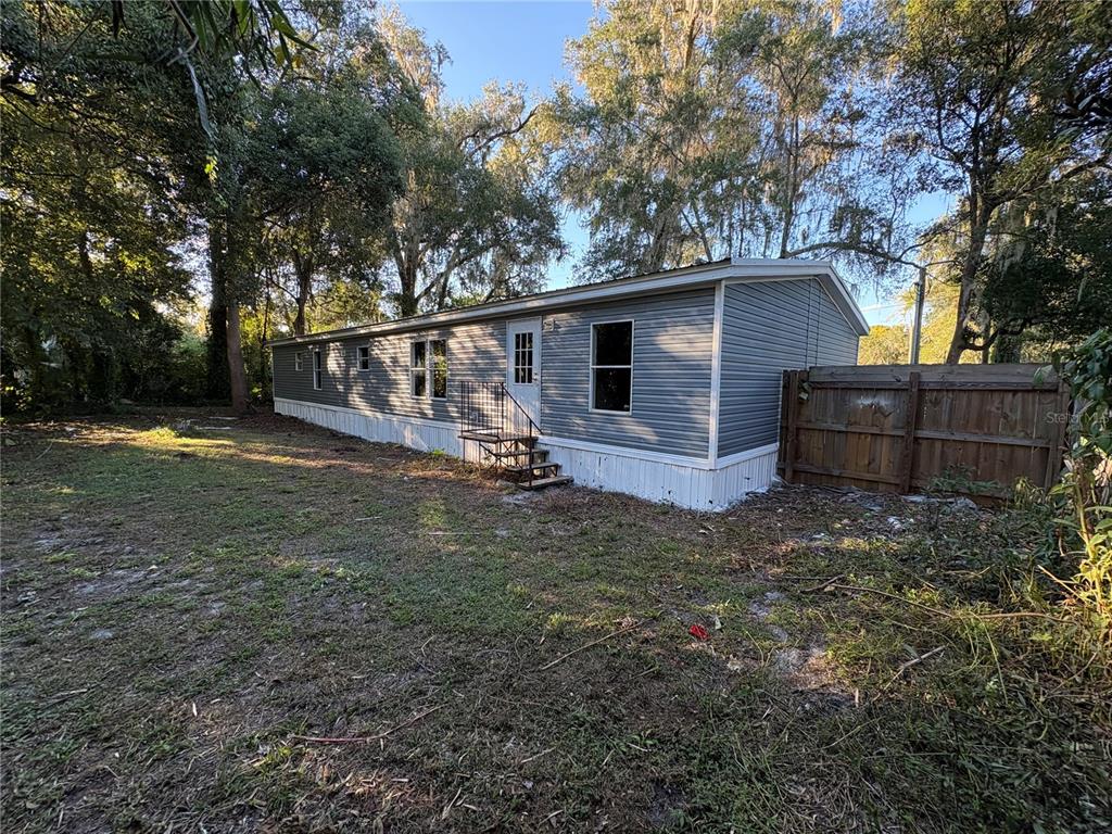 28492 Sentinel Street Nobleton, FL 34661 - Photo 4 of 23 a view of a backyard
