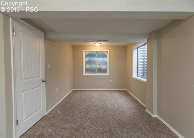 1730 Doherty Road Colorado Springs, CO 80916 - Photo 29 of 32 This is bedroom #3 on the lower level.
