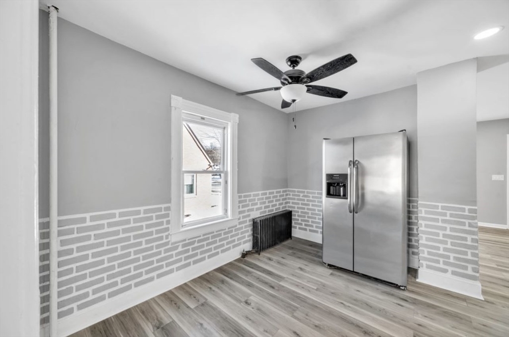 248 Parker Street Springfield, MA 01151 - Photo 9 of 26 a view of a livingroom with a chandelier