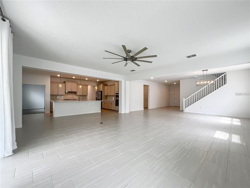 7483 Southwest 64th St Road Ocala, FL 34474 - Photo 13 of 74 a view of an empty room and kitchen view