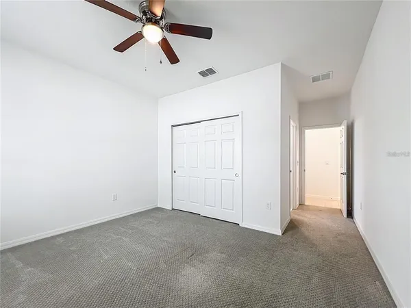 a view of a room with a hallway