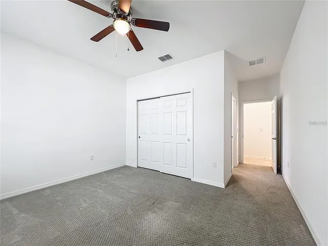 a view of a room with a hallway
