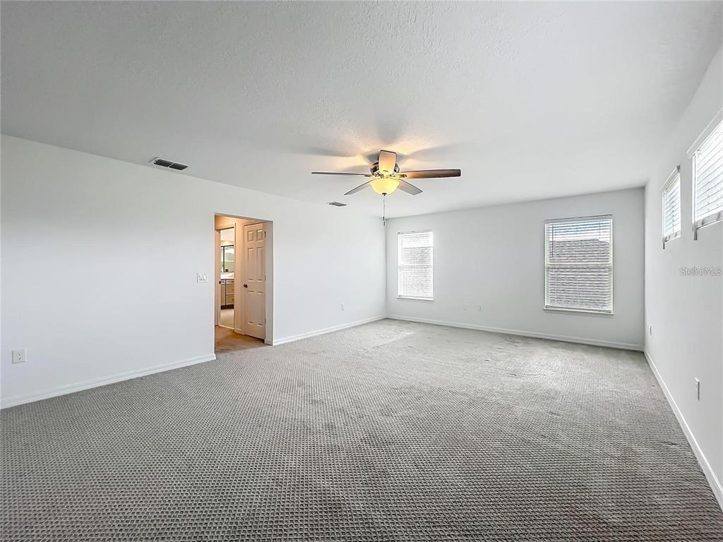 7483 Southwest 64th St Road Ocala, FL 34474 - Photo 40 of 74 a view of an empty room with a window