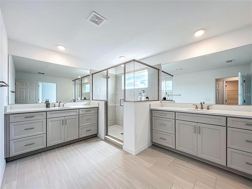 7483 Southwest 64th St Road Ocala, FL 34474 - Photo 41 of 74 a kitchen with sink cabinets and wooden floor