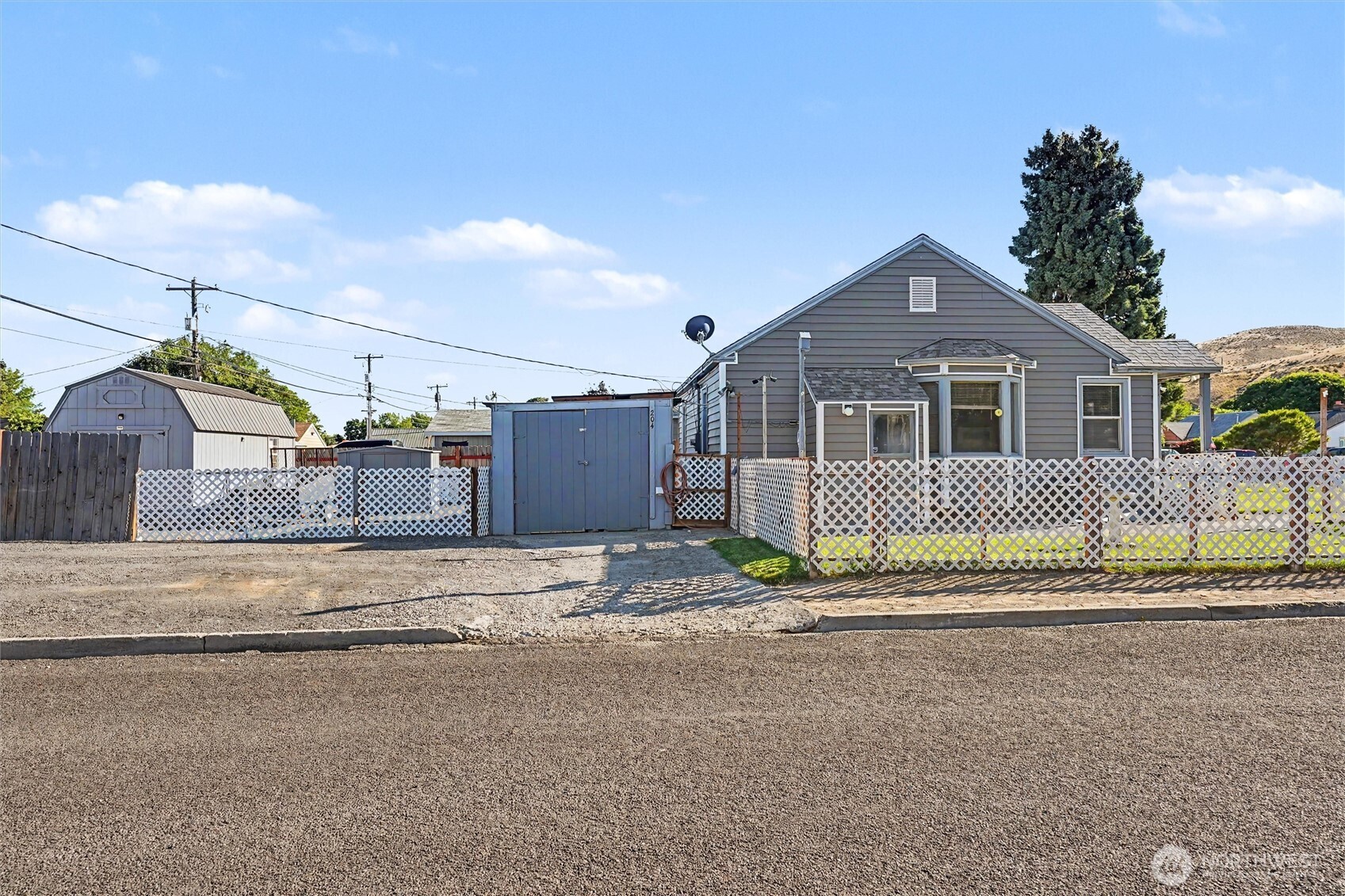 204 E Street Southwest Ephrata, WA 98823 - Photo 26 of 31 a front view of a house with a outdoor space