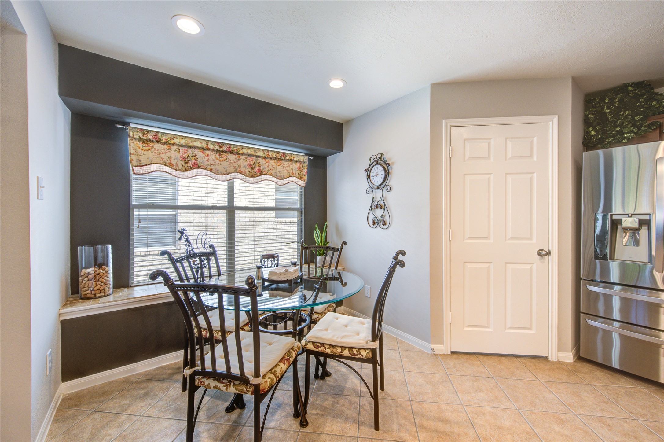 25215 Hazel Ranch Drive Katy, TX 77494 - Photo 12 of 32 a view of a dining room with furniture and a window