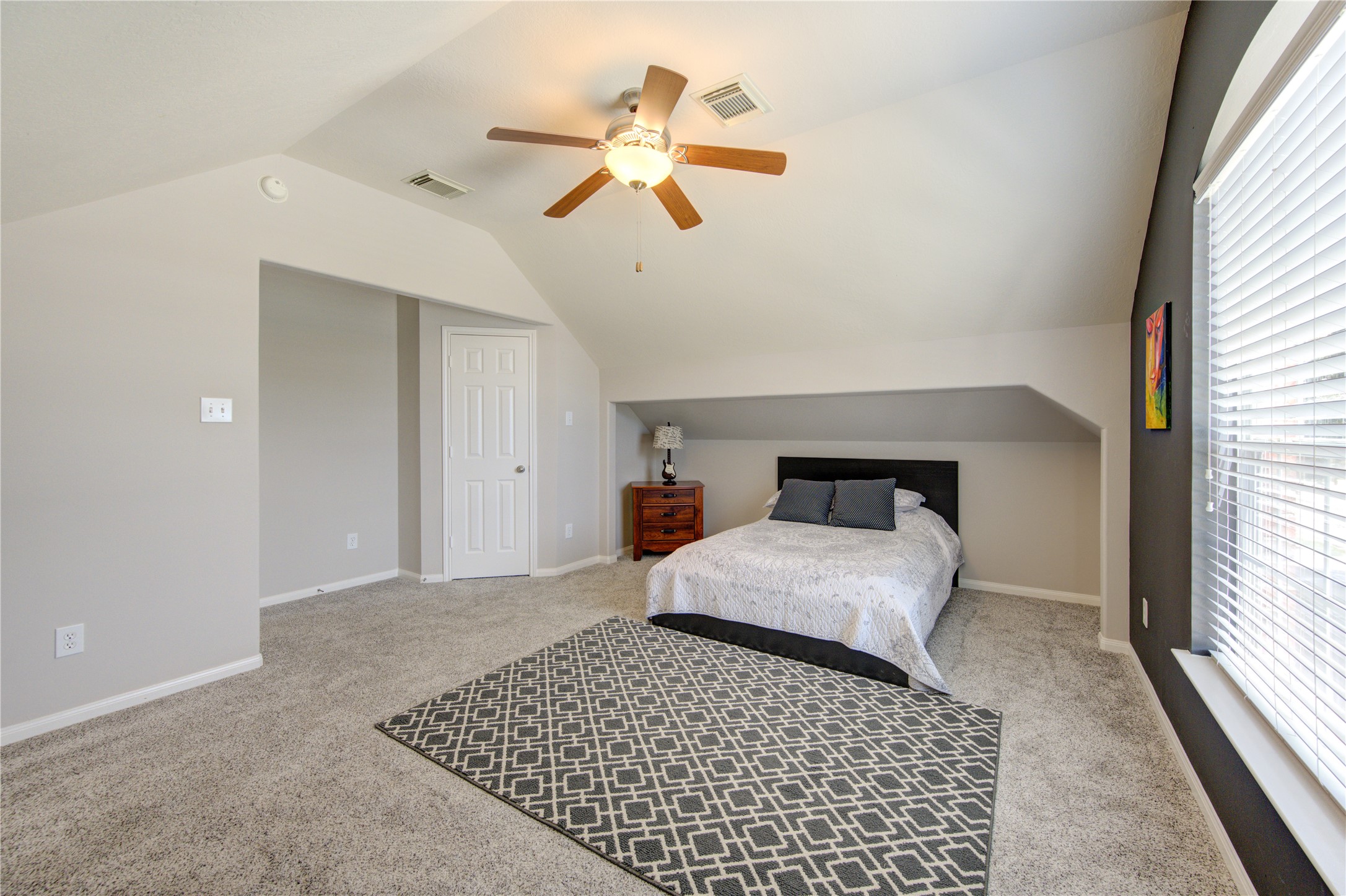 25215 Hazel Ranch Drive Katy, TX 77494 - Photo 23 of 32 a bedroom with a bed and window