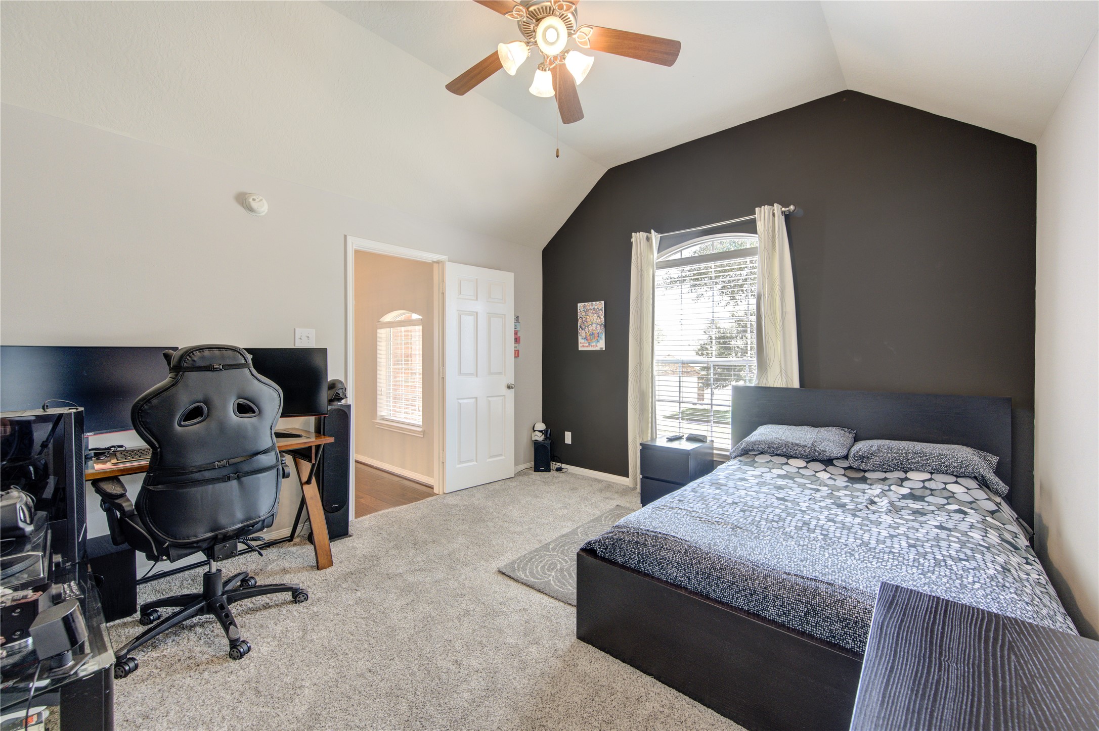 25215 Hazel Ranch Drive Katy, TX 77494 - Photo 25 of 32 a bedroom with a bed chair and window