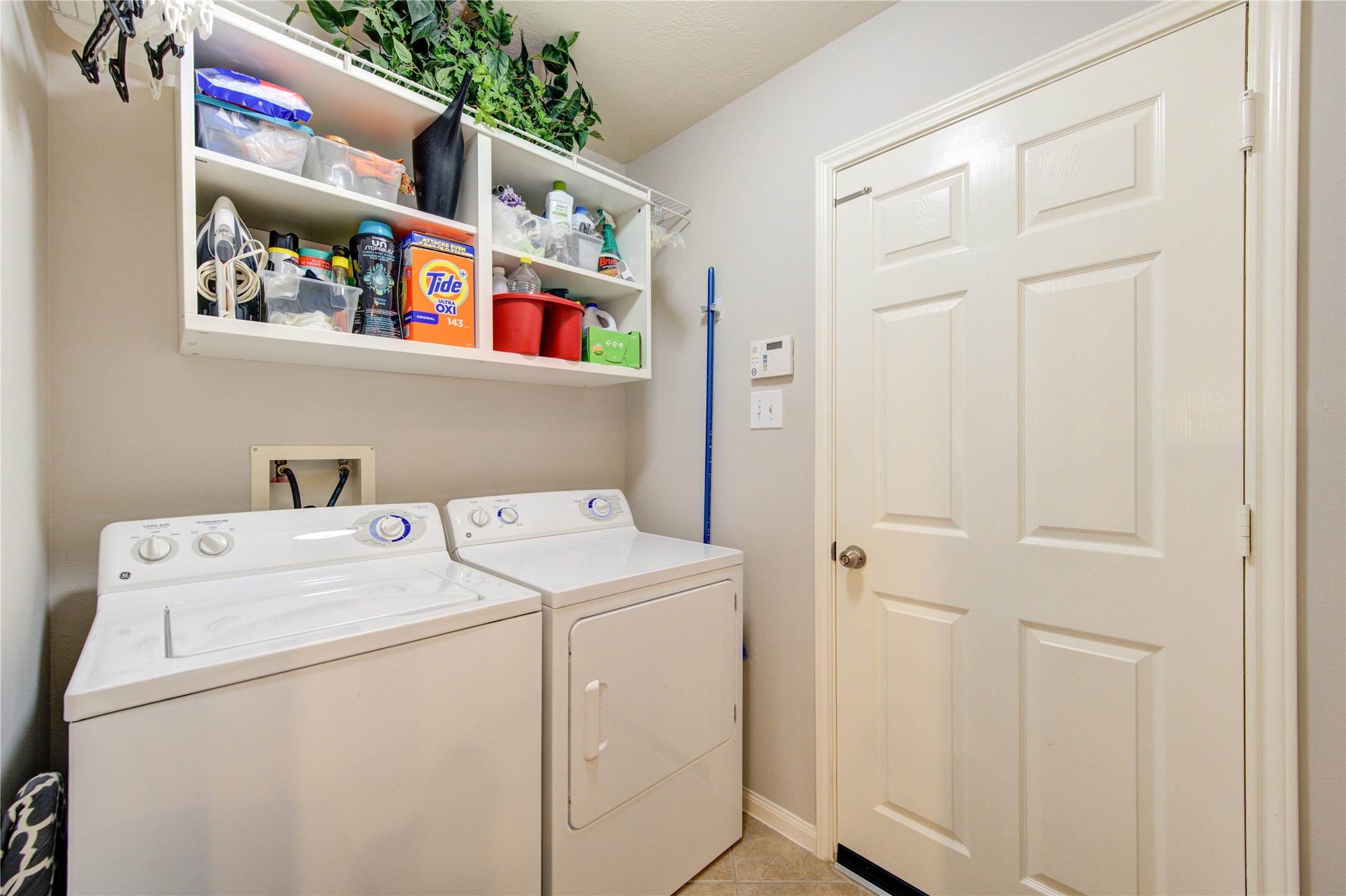 25215 Hazel Ranch Drive Katy, TX 77494 - Photo 28 of 32 a utility room with dryer and washer