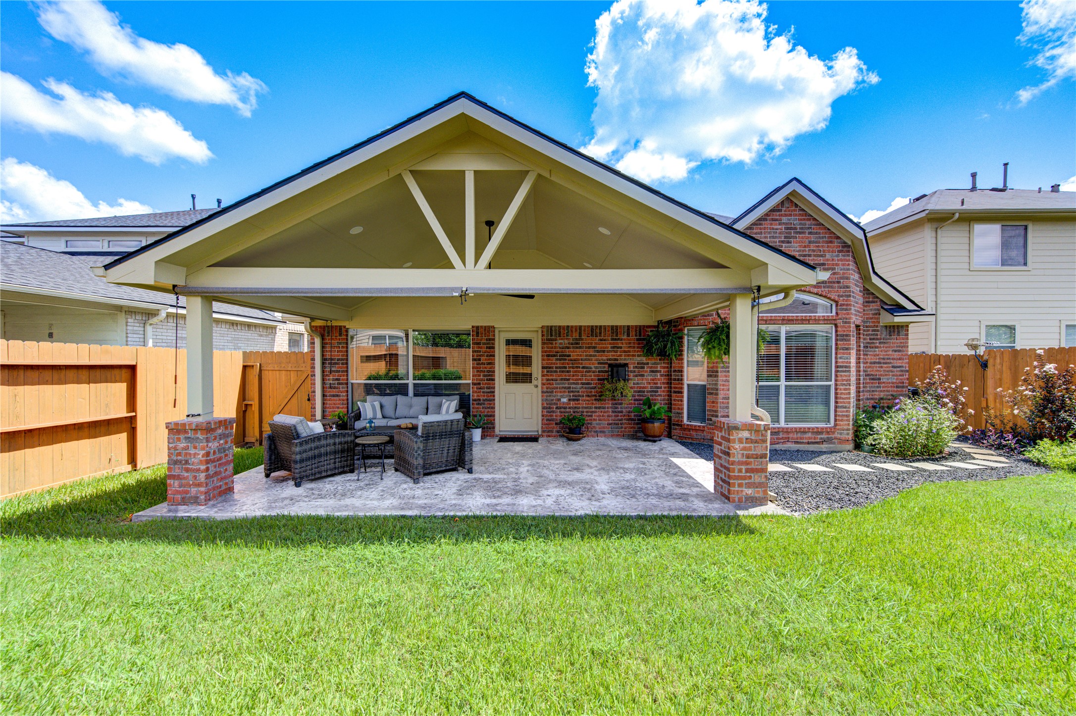25215 Hazel Ranch Drive Katy, TX 77494 - Photo 31 of 32 a front view of house with yard and outdoor seating