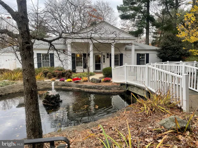 a front view of a house with swimming pool