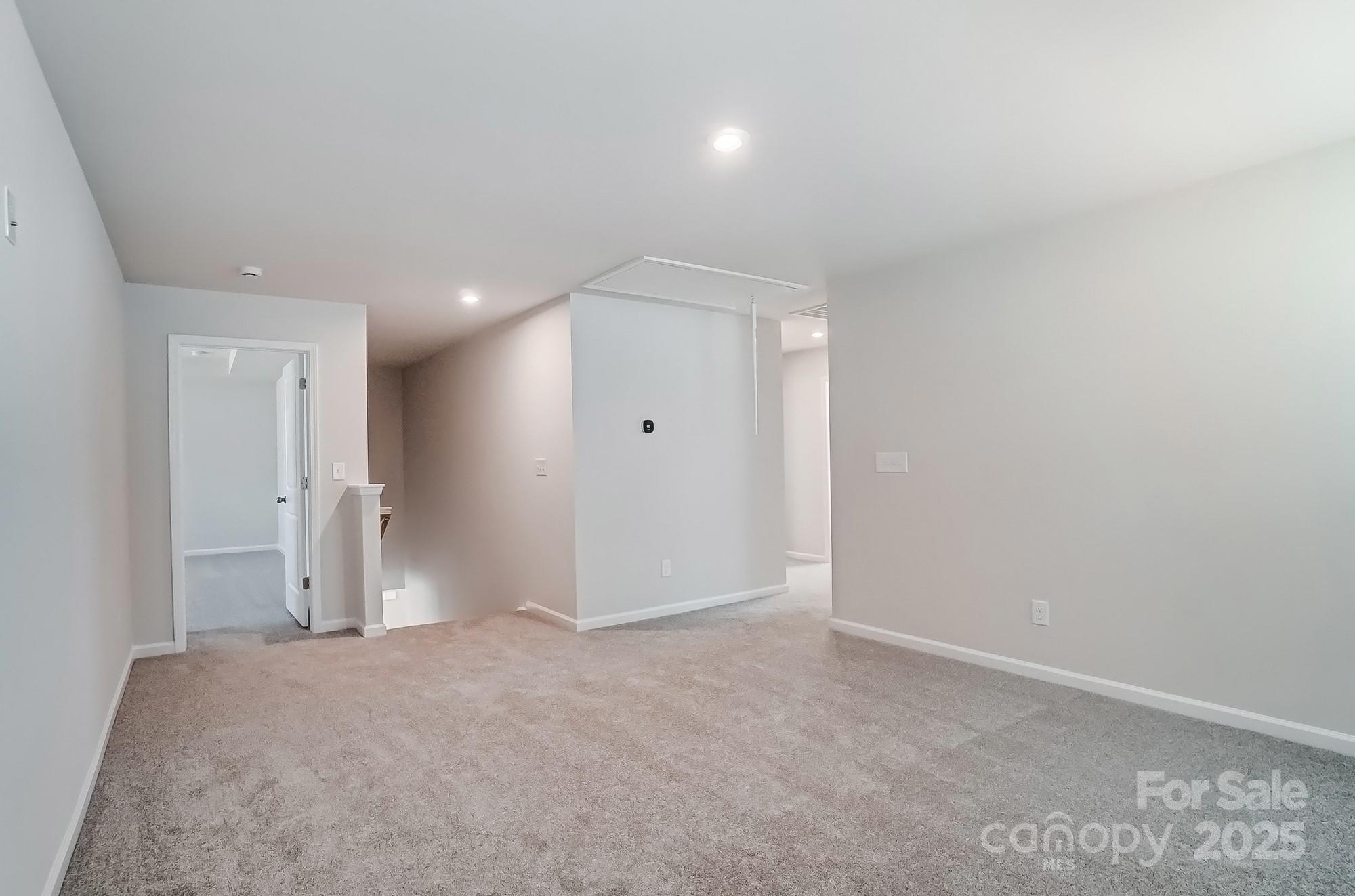 1471 Honey Trail Monroe, NC 28112 - Photo 15 of 27 an empty room with an entryway