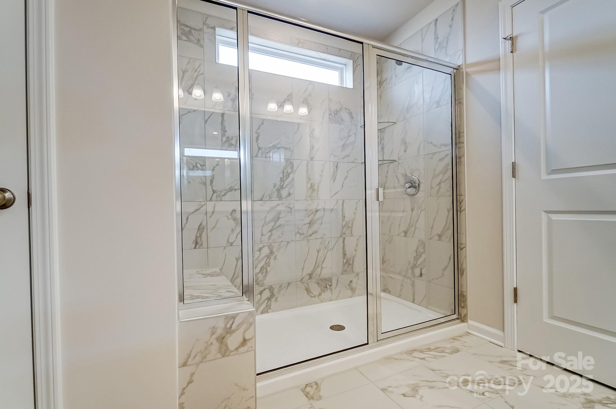 1471 Honey Trail Monroe, NC 28112 - Photo 24 of 27 a bathroom with a shower and a sink