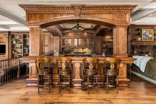 a kitchen with stainless steel appliances granite countertop a stove and a microwave