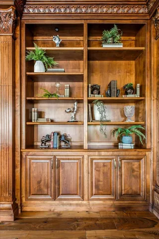 a spacious bedroom with a bed and a couch