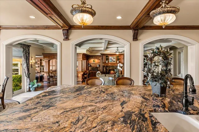 a spacious bathroom with a sink a vanity and a mirror