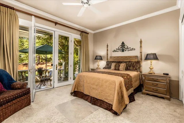 a view of walk in closet and bedroom