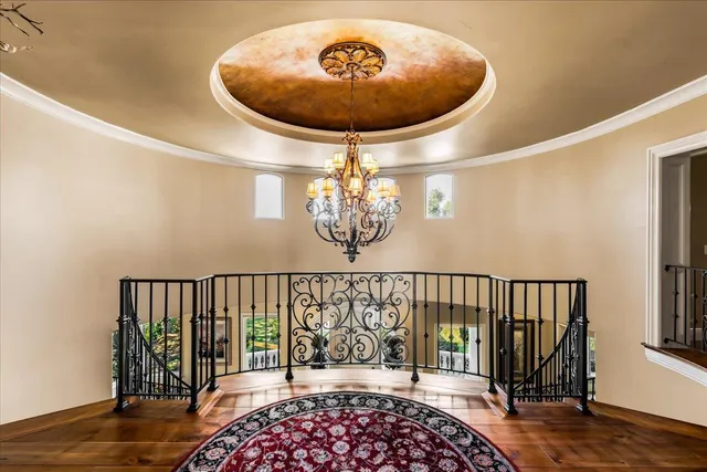 a living room with furniture fireplace and flat screen tv