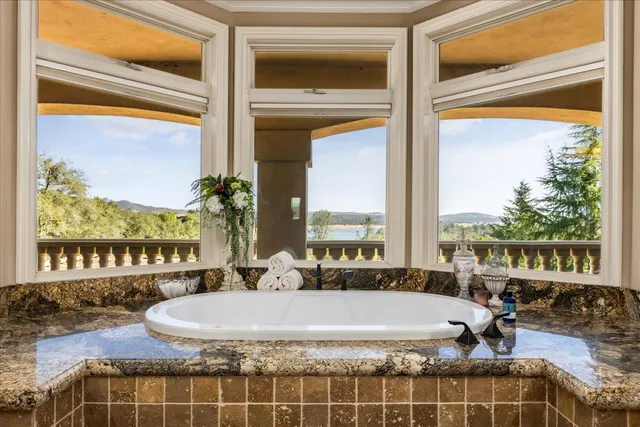 a view of a dining room with furniture window and outside view