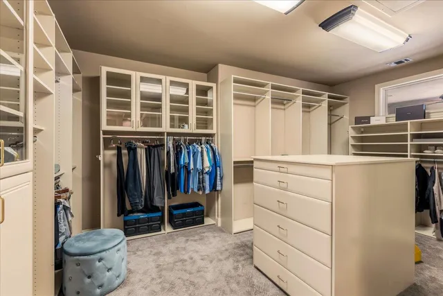 a kitchen with stainless steel appliances granite countertop a lot of counter space