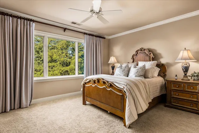 an aerial view of a house with outdoor space