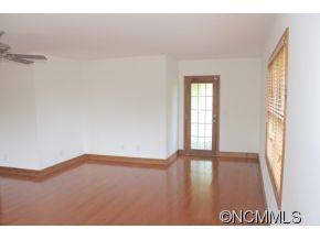 344 Christopher Road Tryon, NC 28782 - Photo 20 of 24 a view of an empty room with a window
