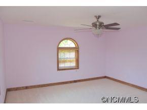 344 Christopher Road Tryon, NC 28782 - Photo 24 of 24 a view of a big room with wooden floor