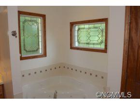 344 Christopher Road Tryon, NC 28782 - Photo 5 of 24 a view of an empty room with a window
